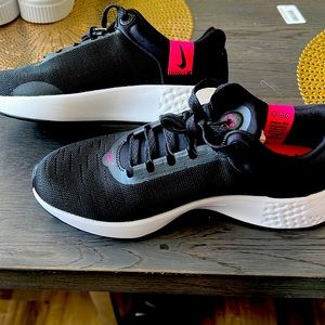 Black with pink Nike running shoes size 8
